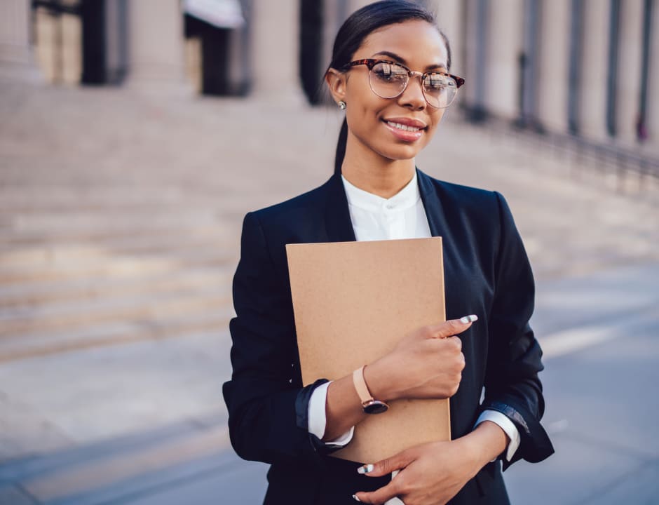 lawyer with folder outside the court