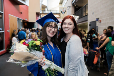 Girls with flowers in the graduation