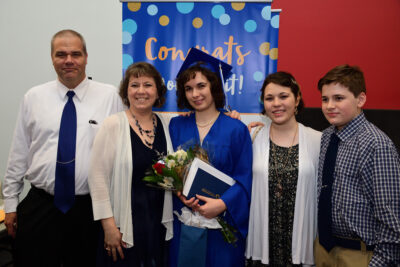 graduated student with her family